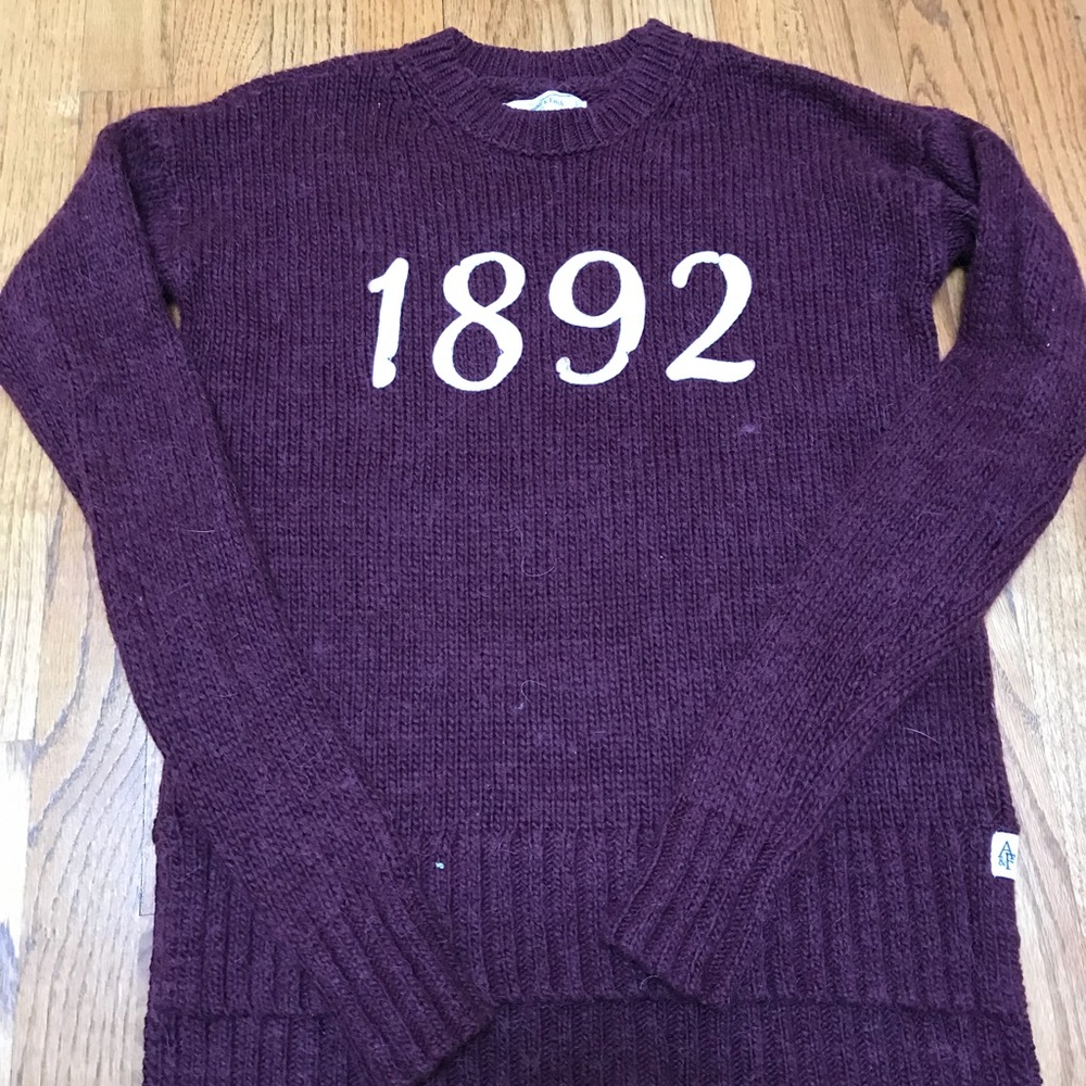 Crew neck sweater with “1892” logo